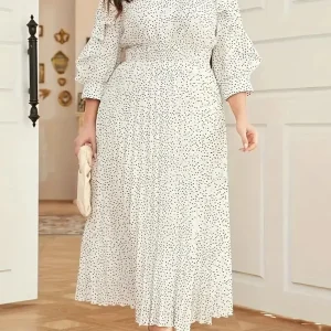Robe blanche a pois noirs femme ronde