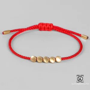 "Trésor Tibétain" Bracelet porte-bonheur en perles de cuivre